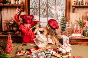 Kinderen tijdens een gezellige kerstfotoshoot in de bakkerijset in Almere