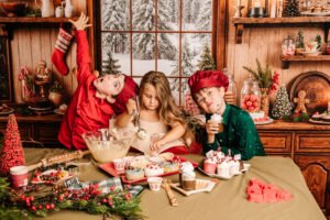 Kinderen tijdens een gezellige kerstfotoshoot in de bakkerijset in Almere