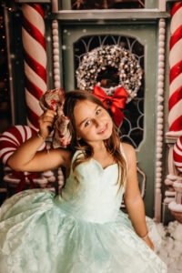 Kinderen tijdens een gezellige kerstfotoshoot in de bakkerijset in Almere