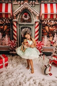 Kinderen tijdens een gezellige kerstfotoshoot in de bakkerijset in Almere